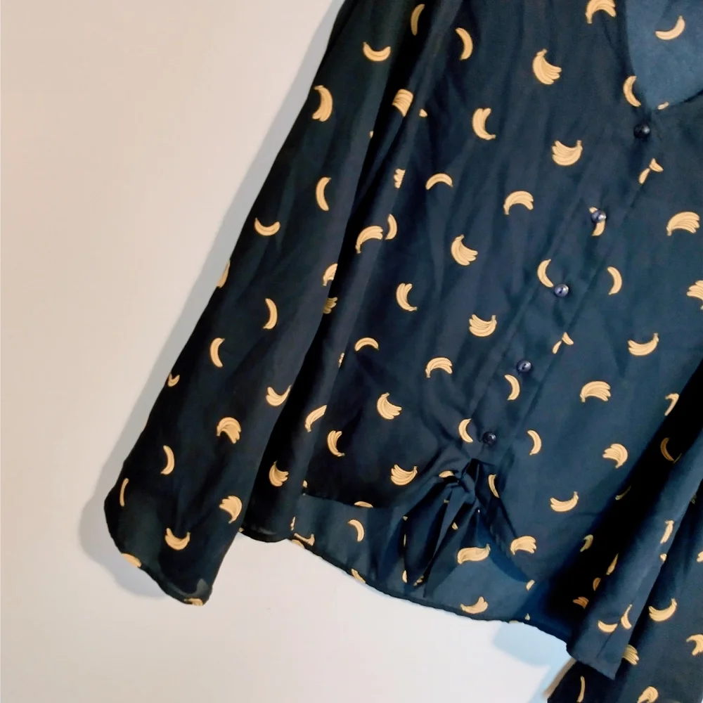 Charming Charlie banana print Navy button up long sleeve top. Size XL